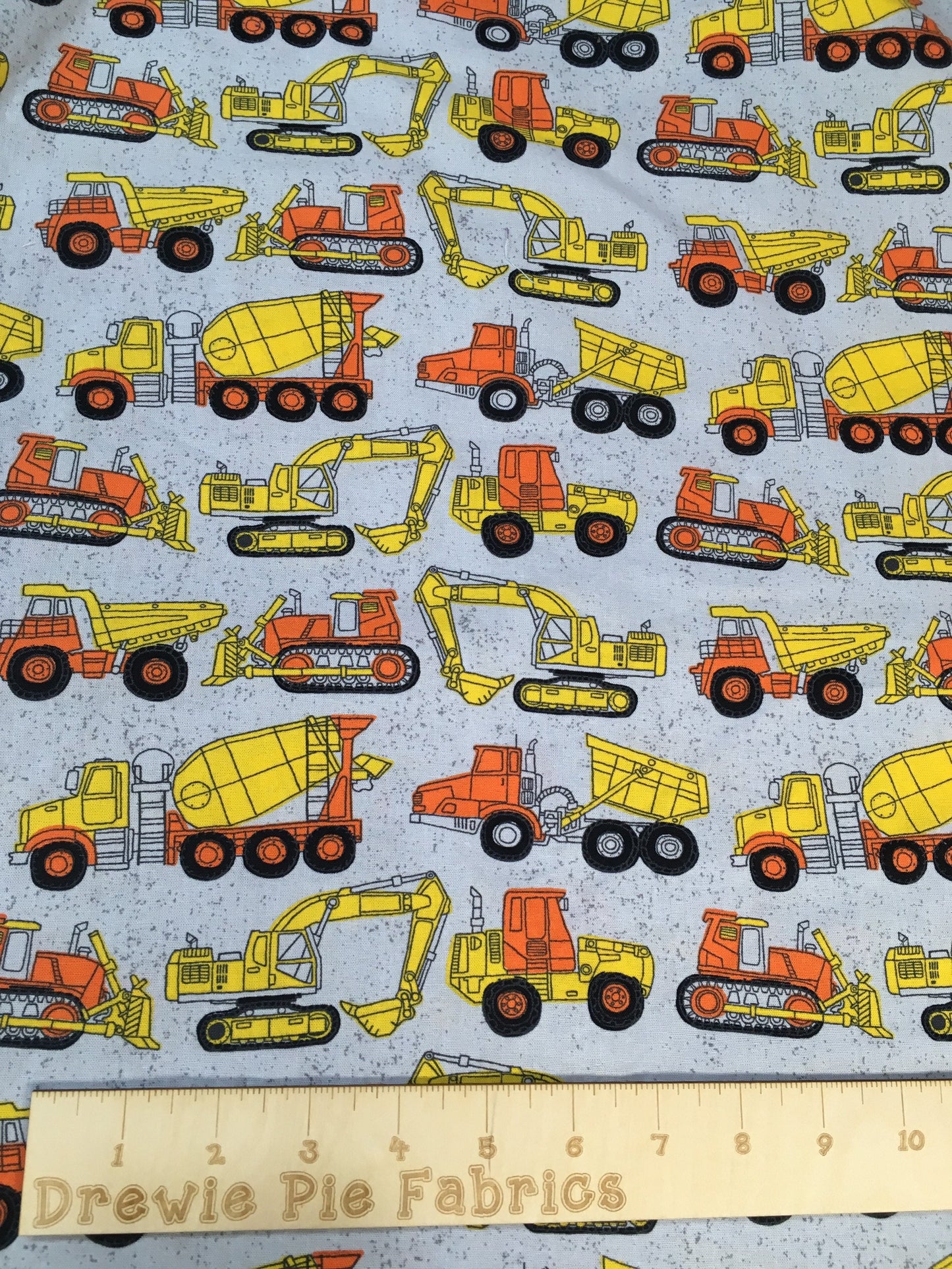 Construction trucks on gray fabric- 100% Cotton - Ready Set Go! Planes, Trains, Trucks