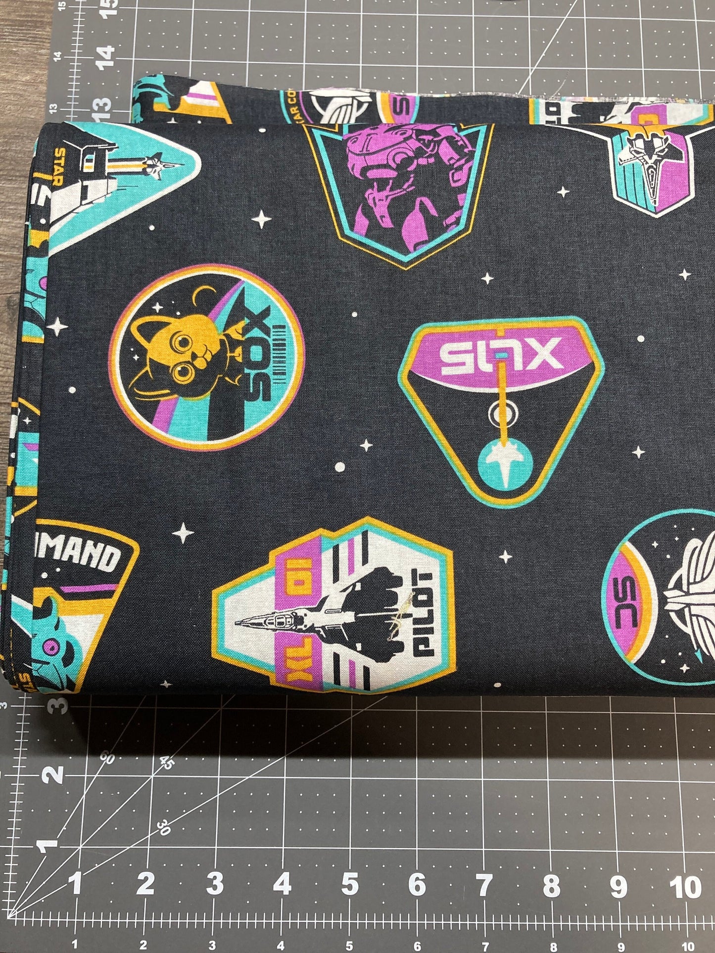 Buzz Lightyear Badges Cotton fabric - 100% Cotton - Licensed Fabric