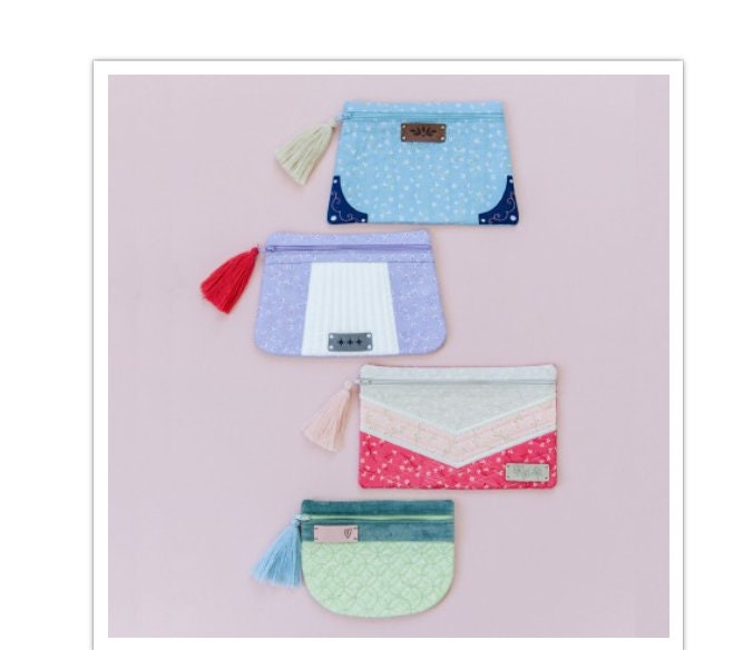 Pretty & Posh Zipper Pouches Designers: Kim Christopherson, Kimberbell Machine Embroidery CD - KIDKD5122