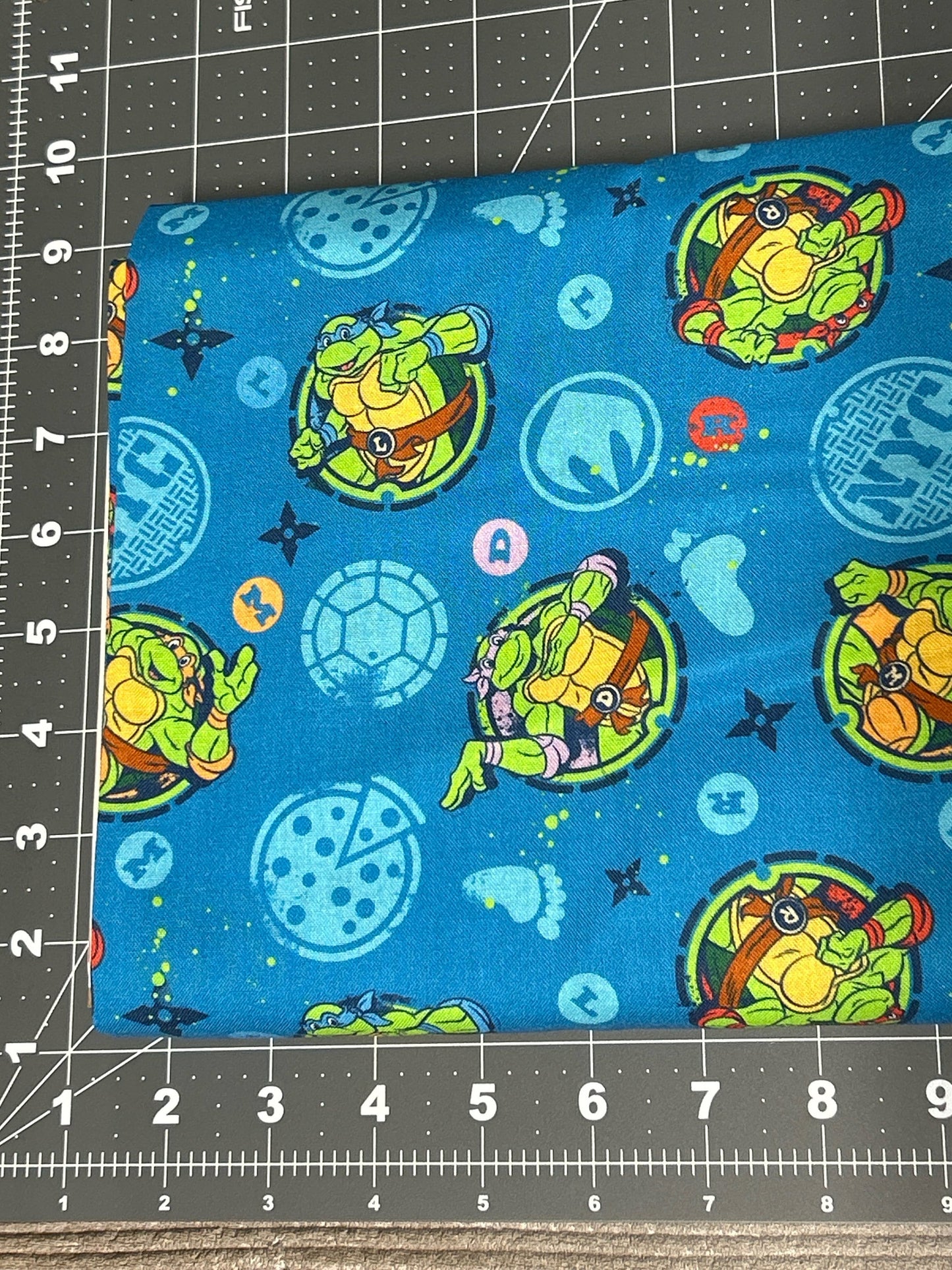 TMNT Badges Cotton fabric - 100% Cotton - continuous cuts- Teenage Mutant Ninja Turtles Licensed Fabric