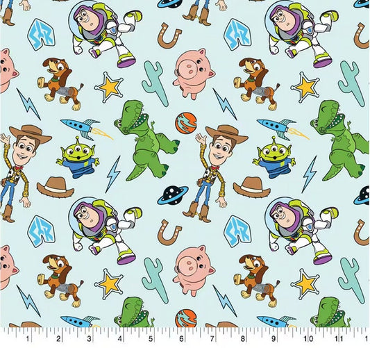 Disney Toy Story Icons on light Blue Cotton Fabric - 100% Cotton Licensed Fabric -