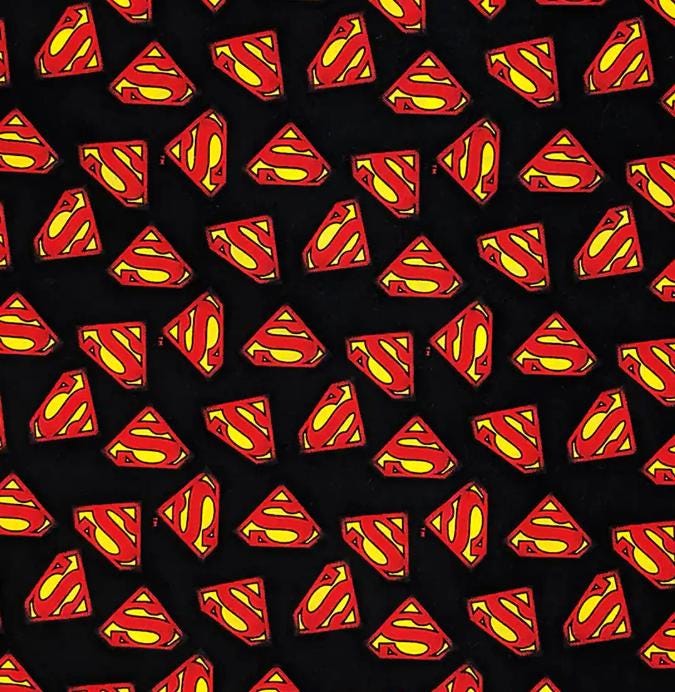 Superman Logos on Black 100% Cotton Fabric - Continuous Cuts Licensed Fabric
